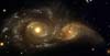  Взаимодействующие галактики NGC2207 и IC2163  
            (69кб)