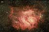 Внутри туманности находится молодое звездное скопление NGC 6530.
            (53кб)